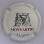 Marque : MONMARTHE N° Lambert : 11b Couleur : Crème pâle, gris et bordeaux Description : Lettre M et nom de la marque  Emplacement : 