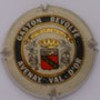 Marque : REVOLTE Gaston N° Lambert : 2 Couleur : Fond crème foncé Description : Blason couronné et   entouré de deux ceps portant des   grappes de raisins Emplacement : 