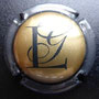 Marque : LACOMBE Georges  N° Lambert : 4 Couleur : Or, contour rouge Description : Initiales Emplacement : 
