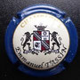Marque :  TASSIN Emmanuel N° Lambert : 19 Couleur :  Contour bleu  Description : Nom de  la marque au-dessus d'une armoirie  Emplacement : 