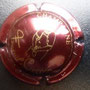 Marque : FENEUIL - COPPEE N° Lambert : 4 Couleur : Bordeaux Description : Homme débouchant une bouteille Emplacement : 