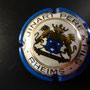 Marque : RUINART N° Lambert : 24a Couleur : Contour bleu  Description : Blason contenant un chevron deux étoiles et un coeur surmonté par une couronne et tenu par deux lions. Emplacement : 