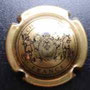 Marque : BRICOUT N° Lambert : 12f Couleur : Or et noir Description : Cartouche surmonté d'une croix et entouré de deux guerriers. Inscription Champagne - France   Emplacement : 