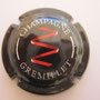 Marque : GREMILLET JM N° Lambert : 4a Couleur : Fond noir, garndes lettres Description : zig-zag rouge  Emplacement : 058-03-02