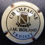 Marque : BOLAND JM N° Lambert : 1 Couleur : Crème Description : Nom de la marque au-  dessous d'un blason de la champagne   encadré de deux coupes  Emplacement : 