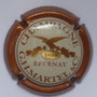 Marque : MARTEL GH & Co N° Lambert : 18b Couleur : Contour marron métallisé Description : Dessin d'un aigle posé sur un cartouche contenant la date 1869  Emplacement : 
