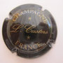 Marque : CASTERS Louis N° Lambert : NR Couleur : Noir Description : Nom du producteur stylisé   Emplacement : 020-04-01