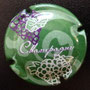 Marque : GENERIQUE  N° Lambert : 684 Couleur : Vert, violet et blanc Description : Inscription   Champagne en lettres cursives,   au-dessus d'une grappe de raisins  Ref perso : 