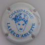 Marque : ARLETTE (la fée d’) N° Lambert : 7 foncé Couleur : Blanc et bleu foncé Description : Tête de femme  Ref perso :