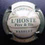 Marque : L'HOSTE Père & Fils N° Lambert : 9 Couleur : Or et vert, fond clair Description : Nom de la marque   Emplacement :