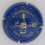 Marque : Hû Jean N° Lambert : 1 Couleur : Bleu et or Description : Bouteille de champagne et nom de la marque  Emplacement : 