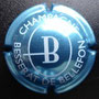 Marque : BESSERAT DE BELEFON N° Lambert : 24 Couleur : Bleu métalisé et blanc Description : Lettre B stylisée  Emplacement : 