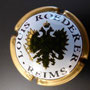 Marque : ROEDERER Louis N° Lambert : 95 - type 1 Couleur :  Contour Or Description : Blason aigle à 2 têtes, tenant   dans ses serres 1 sceptre et un globe,   écusson central contenant un chevalier en   armure.  Emplacement : 094-05-04