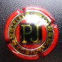 Marque : PERRIER - JOUET N° Lambert : 49 Couleur : Rouge, noir et or Description : Lettres PJ jaunes dans un cartouche noir  Emplacement : 