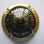 Marque : TRIBAUT G N° Lambert : 2 Couleur : Noir, contour Or Description : Lettres TD dans un blason couronné, soutenu par deux lions  Emplacement : 102-06-04