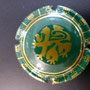 Marque :  UNION CHAMPAGNE SAINT GALL N° Lambert : 4 Couleur :  Vert foncé. Dessin Or Description : Chimère stylisée  Emplacement : 104-01-04