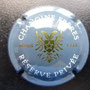 Marque : CHANOINE N° Lambert : 5a Couleur : Gris, blanc et or Description : Inscription Chanoine   frères au-dessus d'un blason avec une   aigle à deux têtes   Emplacement : 