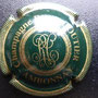 Marque :   COUTIER René N° Lambert : 2 Couleur :  Vert et or strié Description :  Lettres RC stylisées dans un cercle  Emplacement : 