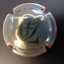 Marque : LACOMBE Georges  N° Lambert : 1 Couleur : Gris et or, contour rouge Description : Initiales Emplacement :