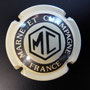 Marque : MARNE & CHAMPAGNE N° Lambert : 1 Couleur : Gris crème et noir Description : Lettres MC dans un hexagone   Emplacement : 074-06-01