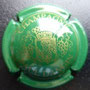 Marque : DANGIN PAUL  N° Lambert : 8 Couleur : Vert et or Description : Blason couronnée encadré de deux grappes de raisins - nom de la marque  Emplacement : 