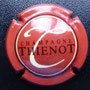 Marque : THIENOT Alain N° Lambert : 18 Couleur : Fond brique Description : Lettre T en cursive au -  dessus du nom de la marque  Emplacement : 