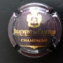 Marque : BEAUMONT de CRAYERES N° Lambert : 2 Couleur : Marron foncé et Or Description : Nom du producteur  Emplacement : 