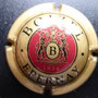 Marque : BOIZEL N° Lambert : 9 - type 3  Couleur : Or, bordeaux et noir Description : B dans un blason   entouré de deux lions  Emplacement : 