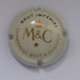 Marque :  MOET & CHANDON N° Lambert : 218 Couleur :  Quart crème,. Brut impérial Description : Initiales MC couronnées et nom de la marque  Emplacement : 