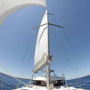 You hear only flapping the sails in the wind and roaring of the water. Nothing else! That means sailing!