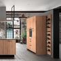 cuisine intérieur design tendance moderne  à toulouse type industriel industrielle bois et métal noir ilot central et mur de colonnes suspensions