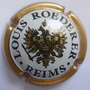 Marque : ROEDERER Louis N° Lambert : 96c Couleur : Contour Or pâle - verso or Description : Blason aigle à 2 têtes, tenant dans ses serres 1 sceptre et un globe, Ècusson central contenant un chevalier en armure.  Emplacement : 