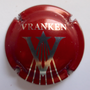Marque : VRANKEN N° Lambert : 39a Couleur : Rouge et argent. Ecriture fine Description : Lettre V et étoile filante au-dessus du nom de la marque  Emplacement : 