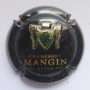 Marque : MANGIN & Fils N° Lambert : 12a Couleur : Estampée,noir et or. Texte sur le contour Description : Nom de la marque au dessous d’un blason couronné  Emplacement : 