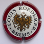 Marque : ROEDERER Louis N° Lambert : 90 Couleur : Bordeaux et or  Description : Blason aigle à 2 têtes, tenant   dans ses serres 1 sceptre et un globe,   écusson central contenant un chevalier en   armure.  Emplacement : 094-05-01
