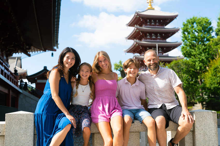 Tokyo family photoshoot at Sensoji Temple pagoda — relaxed, joyful portrait capturing authentic Japan feel.