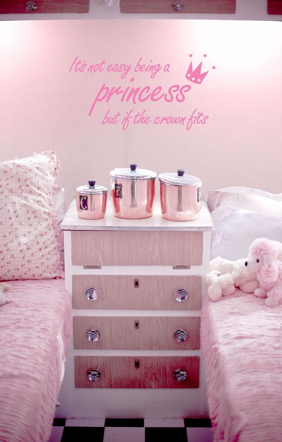 It's not easy being a princess but if the crown fits vinyl sticker in a girls bedroom. The design has a cute little crown hovering over the word princess. This vinyl quote comes in many colours and custom sizes at wallartcompany.co.uk