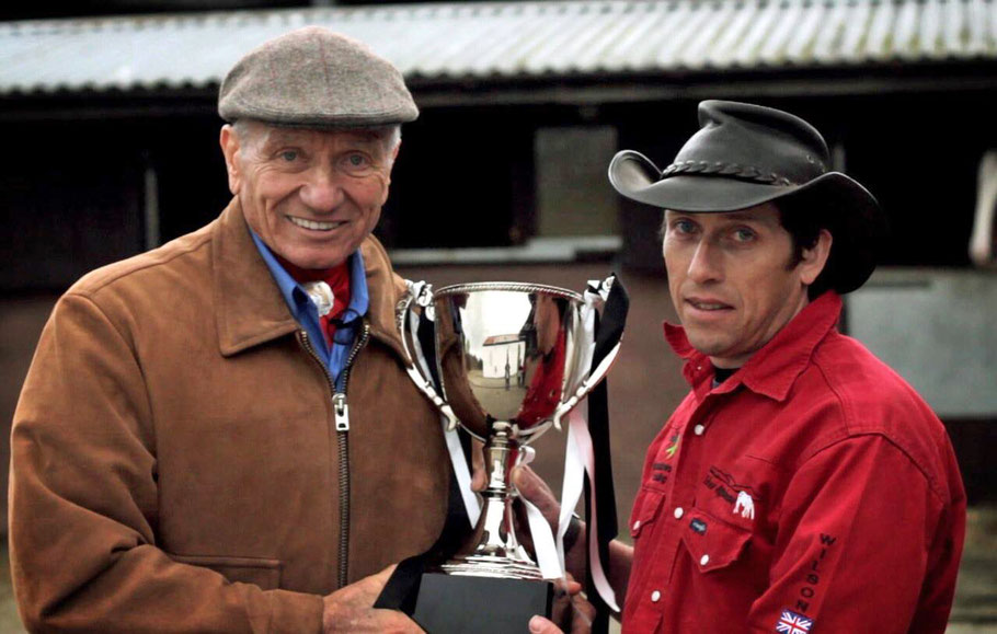 Dan proudly showing Monty the "Horsemanship Calling" trophy he and Grant Bazin won together in 2014.