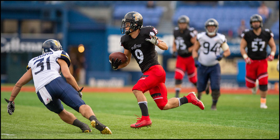 Wideout Junpei Yoshimoto takes a short pass to the house against Lions earlier this season