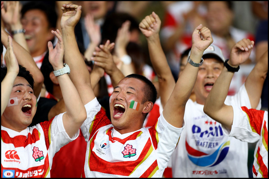 Japanese fans celebrate a famous victory - Clive Rose (World Rugby via Getty)