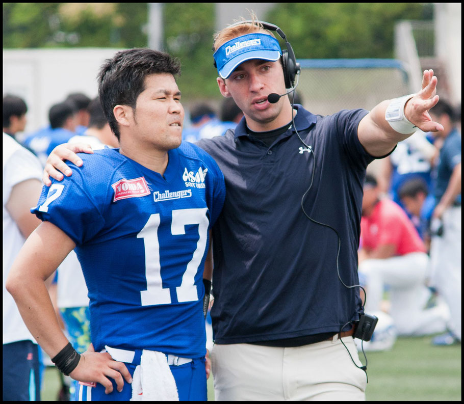 Challengers QB / Coach Alex Niznak giving advice to to QB Yusaku Miyagi — Lionel Piguet, Inside Sport: Japan, May 21, 2017