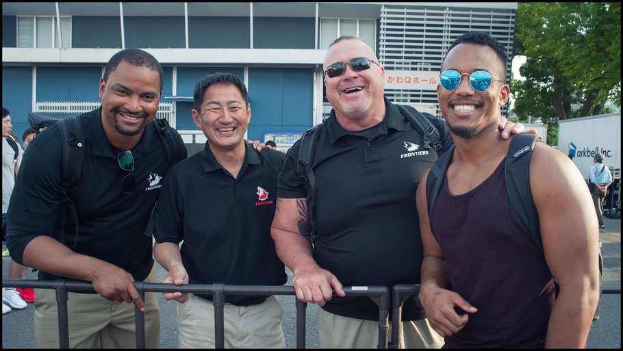 Frontiers former RB Gino Gordon (right) with Fujitsu coaches after the game — John Gunning, Inside Sport: Japan, April 22, 2018