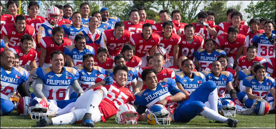 Players from Japan and The Philippines after the game - John Gunning, Inside Sport: Japan, April 26, 2014