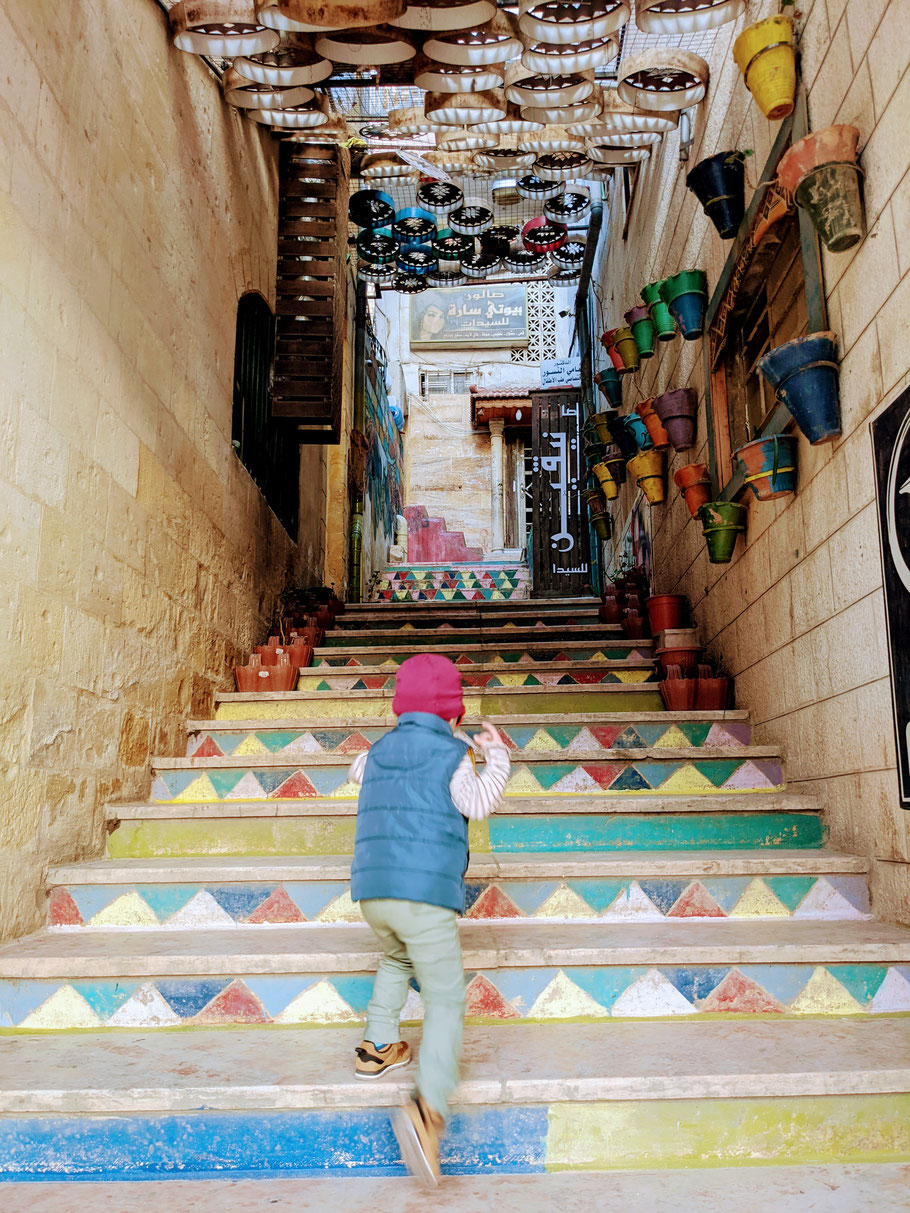 Johanna climbing a street in beautiful As-Salt city 