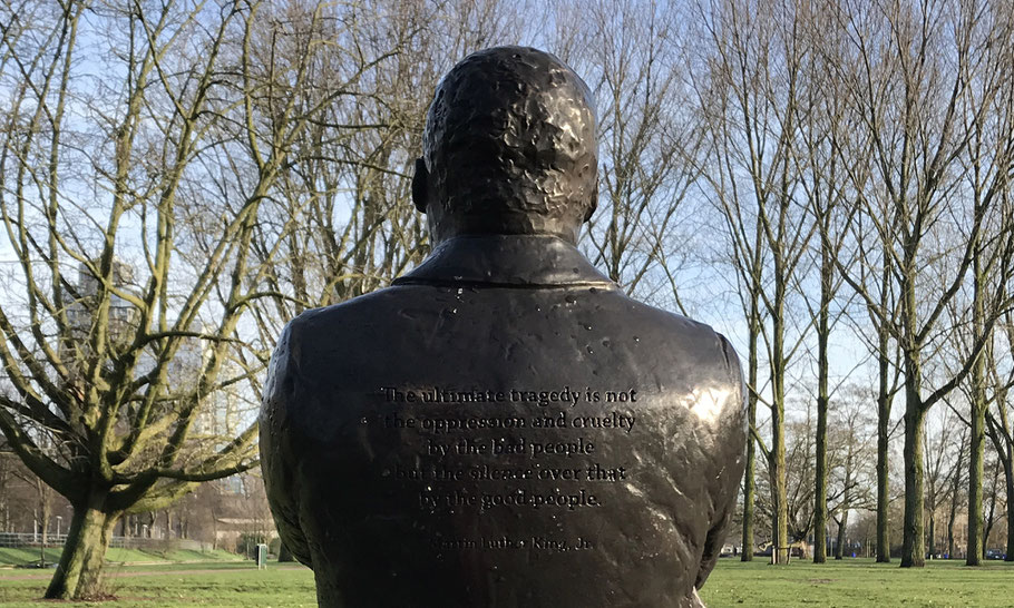 MLK Statue, quote on back: "The ultimate tragedy is not the oppression and cruelty by the bad people,  but the silence over that by the good people"