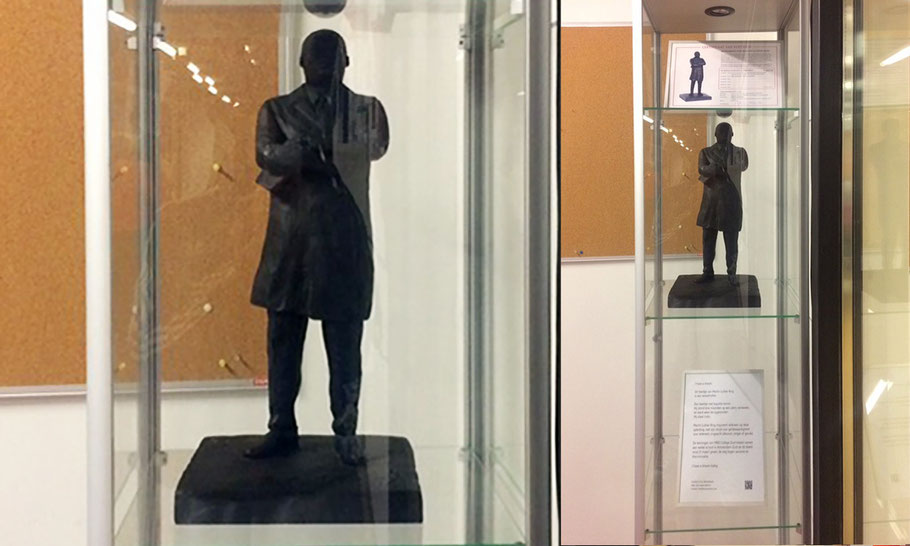 The statue got his own display case inside the school