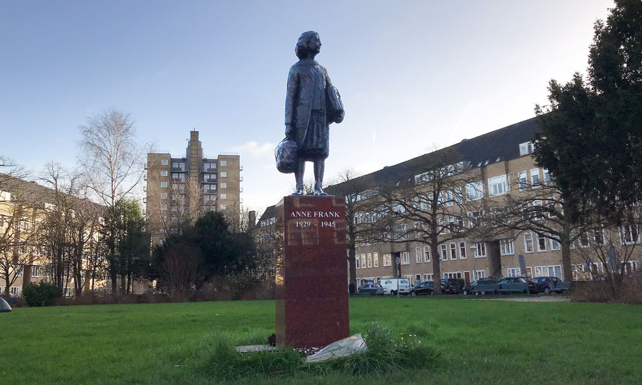 Merwedeplein, Anne Frank statue (2005) by Jet Schepp, an initiative by book seller Gert-Jan Jimmink. In the background Amsterdam's first skyscraper (1932) by J.F Staal