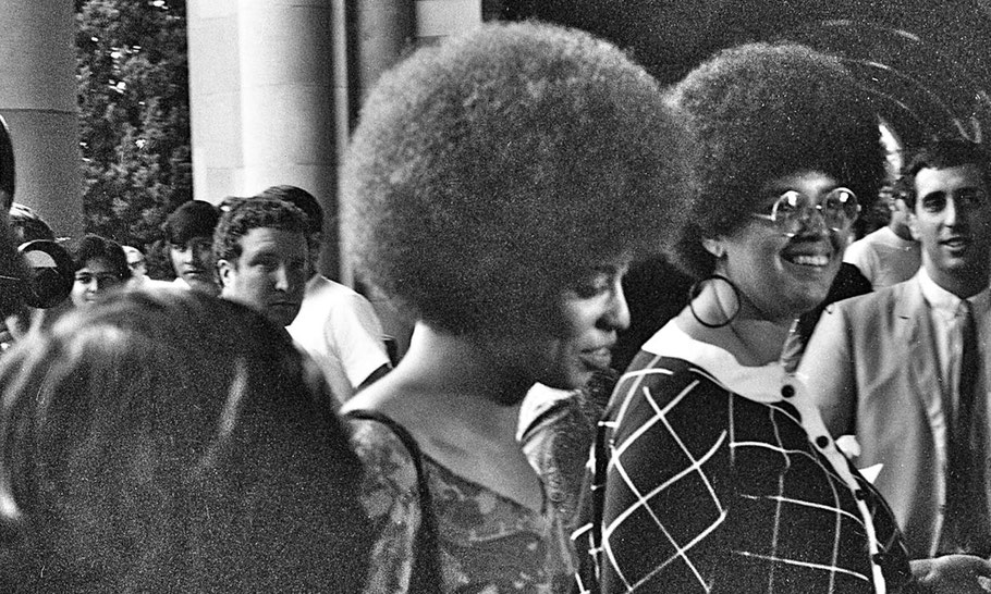 Angela Davis enters Royce Hall for her first lecture, October 7, 1969