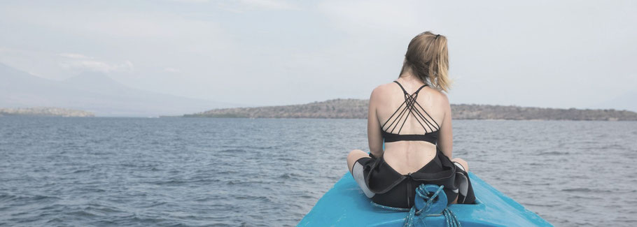 Melissa on a boat in Indonesia