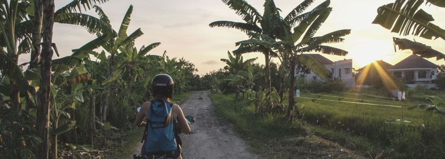 Melissa on a scooter in Indonesia